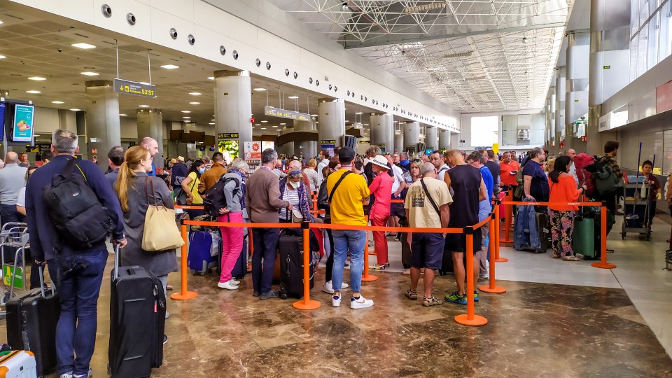  Tourists on the island try to fly from Tenerife Airport