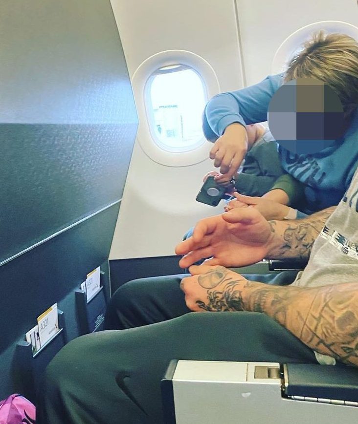  A woman has sparked disgust on social media for clipping her kid's toenails during a flight