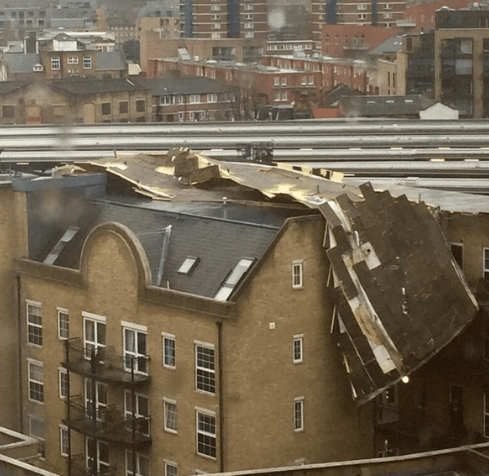  A roof is ripped off a building in Paddington, central London