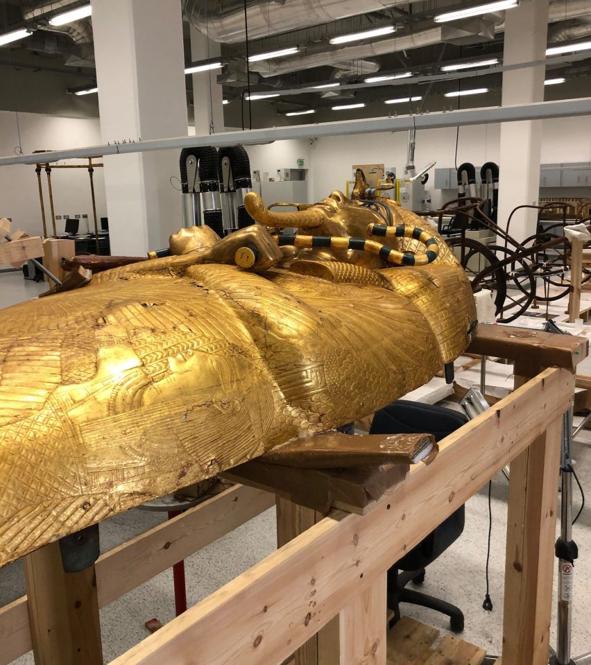  The coffin is made of wood and coated in gold