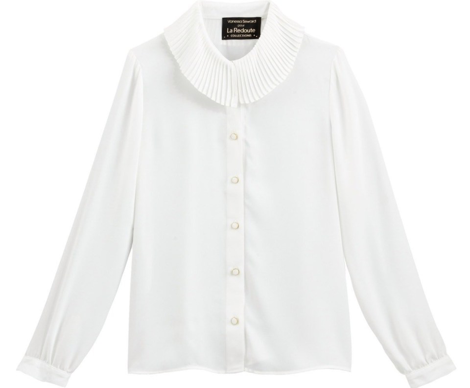 This chic blouse just screams elegance - just make sure the kids don't get any stains on it 