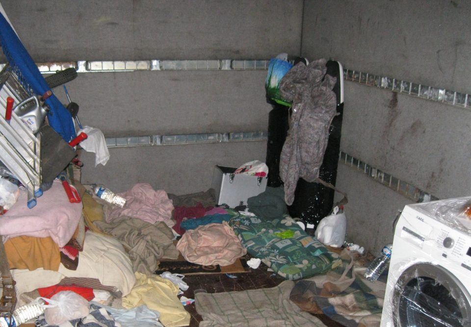  Eliska was smuggled overseas in a shipping container, along with three other kids. Above, inside a people smuggler's lorry in Essex, where 22 migrants were hidden among washing machines and tumble dryers