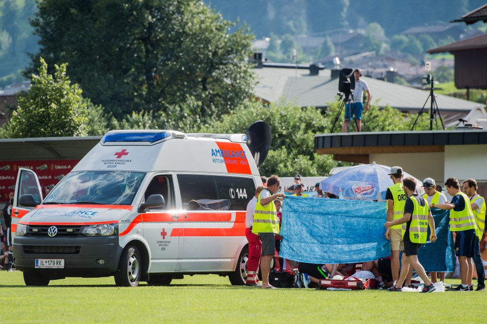  Medics held a barrier around Nouri as they attempted to treat him on the pitch in the pre-season friendly against Werder Bremen