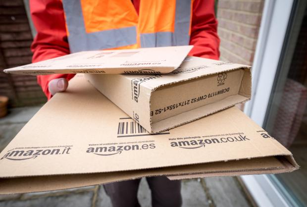 Amazon delivery man with parcels