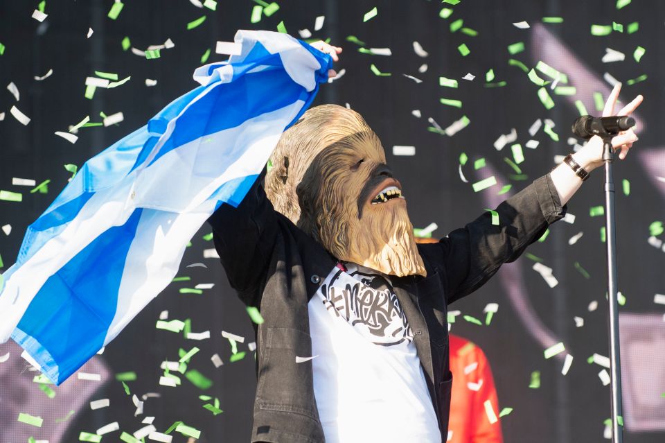  Lewis walked out at TRNSMT Festival in Scotland wearing a Chewbacca mask and holding a Scotland flag after comments by Noel