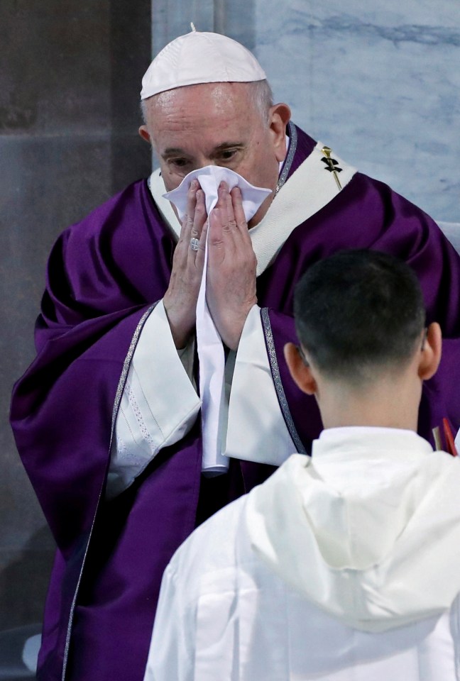 Pope Francis coughs during a service, and has cancelled his Sunday service