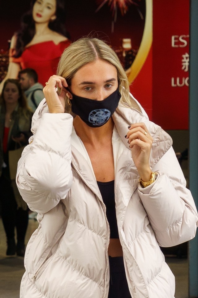  Megan McKenna avoids coronavirus as she wears mask on flight back from LA