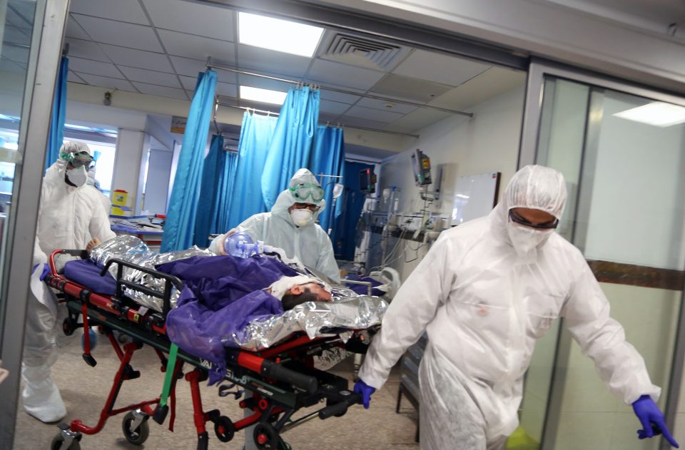  A coronavirus patient is treated at a hospital in Tehran