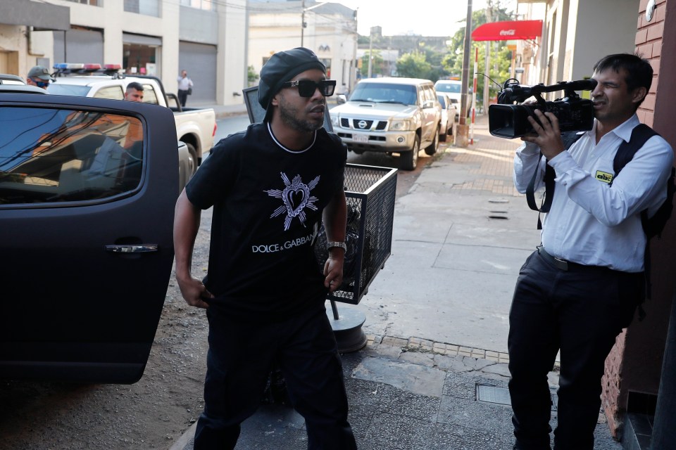  Ronaldinho arrives to speak to prosecutors in Paraguay today