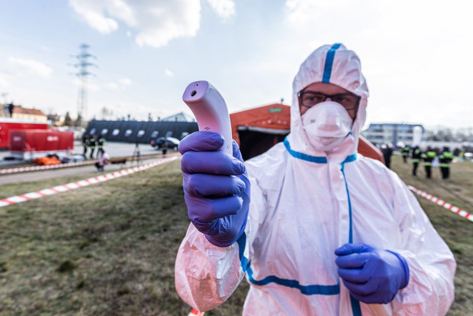  A healthworker partakes in a preparation exercise against the coronavirus outbreak