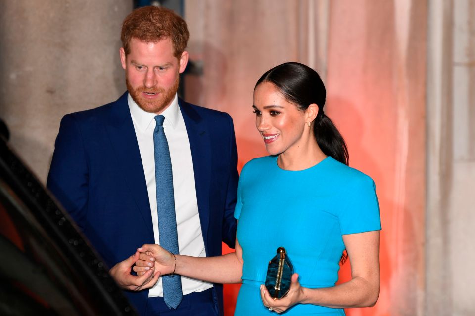 The couple were pictured giving each other little, loving touches throughout the night