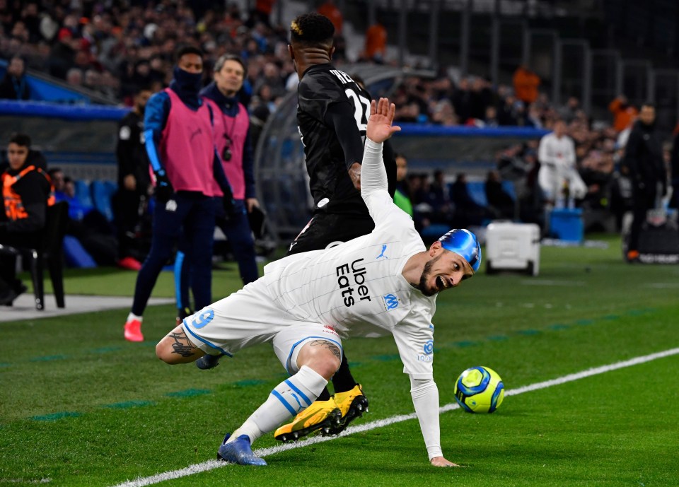 Dario Benedetto also drew looks for wearing a swimming cap during the game