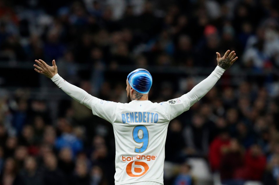 The Marseille striker was given the bright blue headwear as a peculiar injury treatment