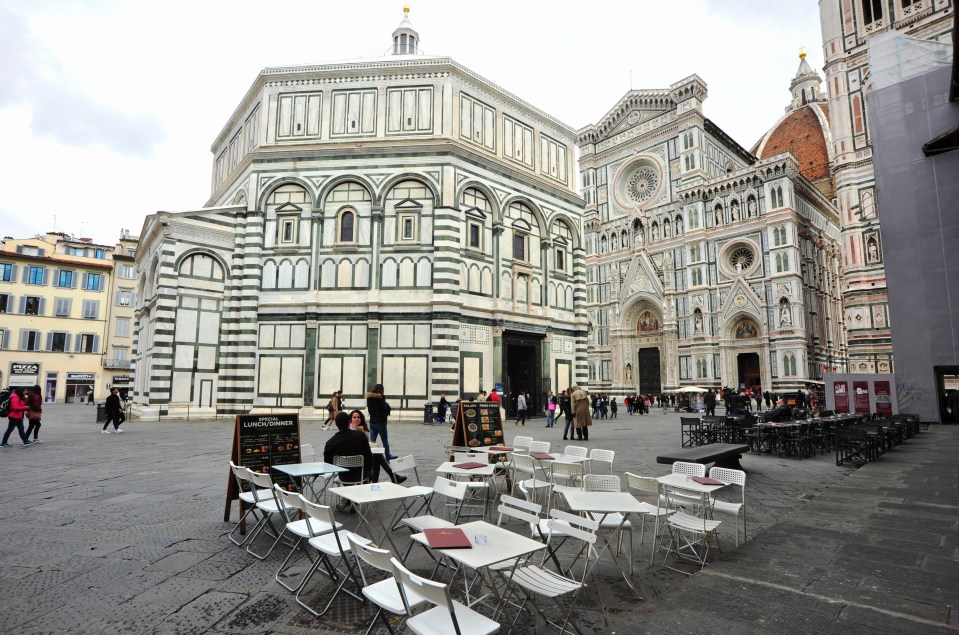  Deserted tables in Piazza of Duomo, Florence