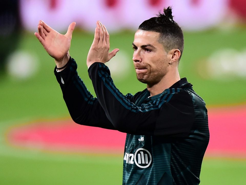  Juventus superstar Cristiano Ronaldo milks the silent applause from an empty Allianz Stadium, normally packed for such a huge fixture