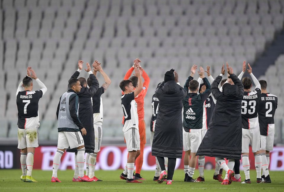  The victorious Juventus players celebrated in front of the empty stands