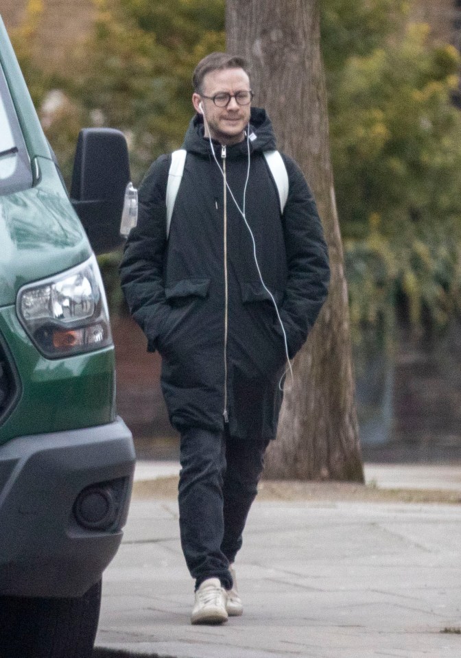  He had his earphones and was dressed in a coat