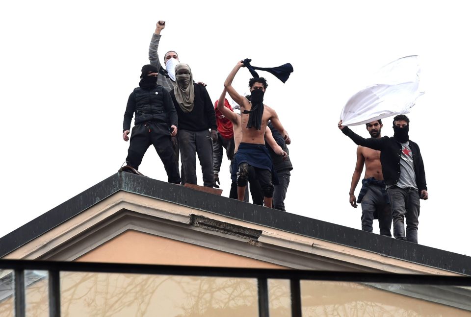  Prisoners of the San Vittore Prison protest on the roof against their treatment during the coronavirus outbreak in Milan