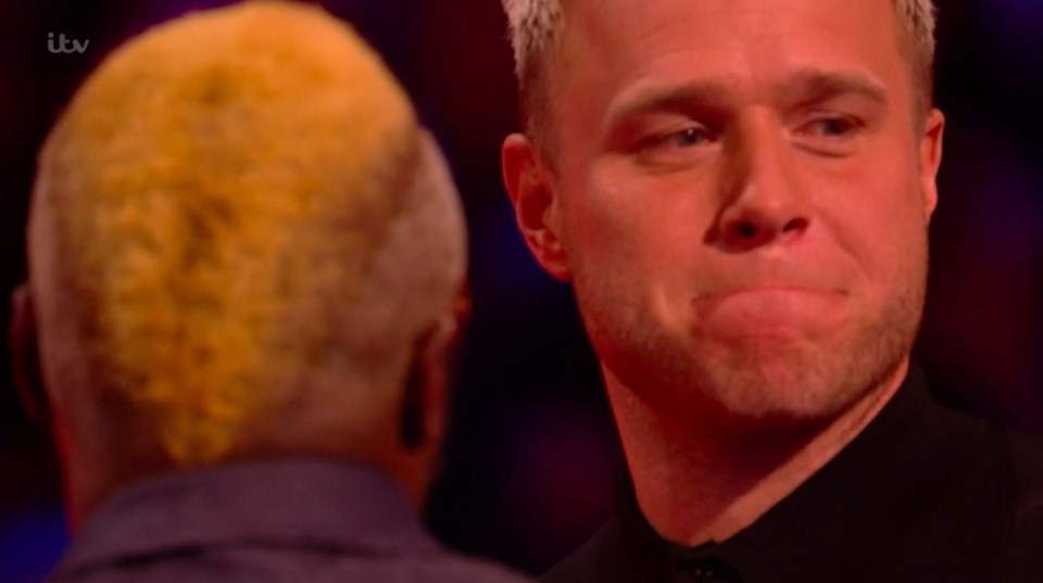 Olly Murs broke down in tears on The Voice after watching the twins perform