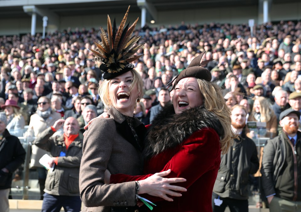  Racegoers react at the Cheltenham Festival