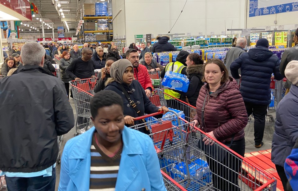 Customers queue at an Essex branch of Costco