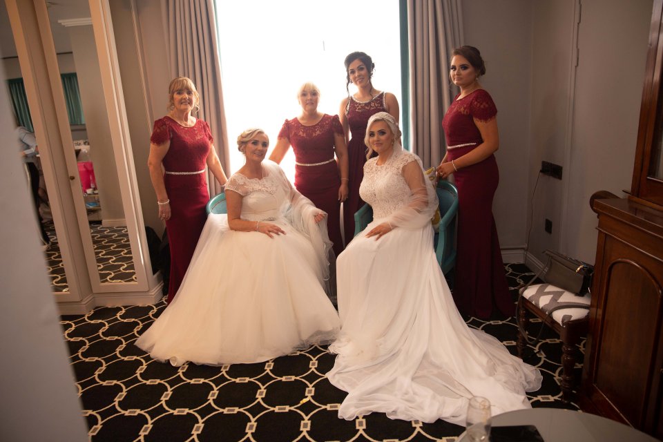  Mum and daughter surrounded by their bridesmaids