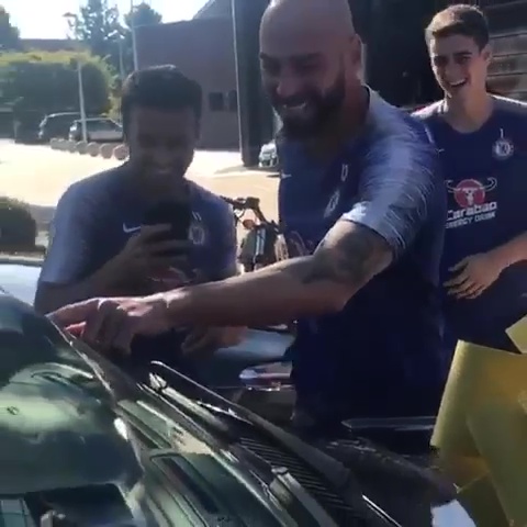  Caballero laughs as he points out a crack on the windscreen