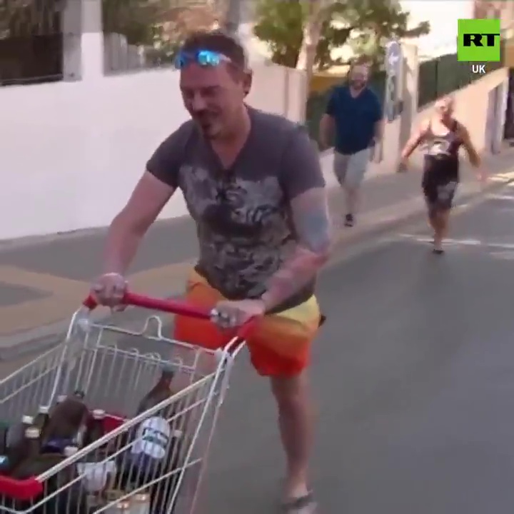  People were shown pushing trolley-loads of alcohol through the streets