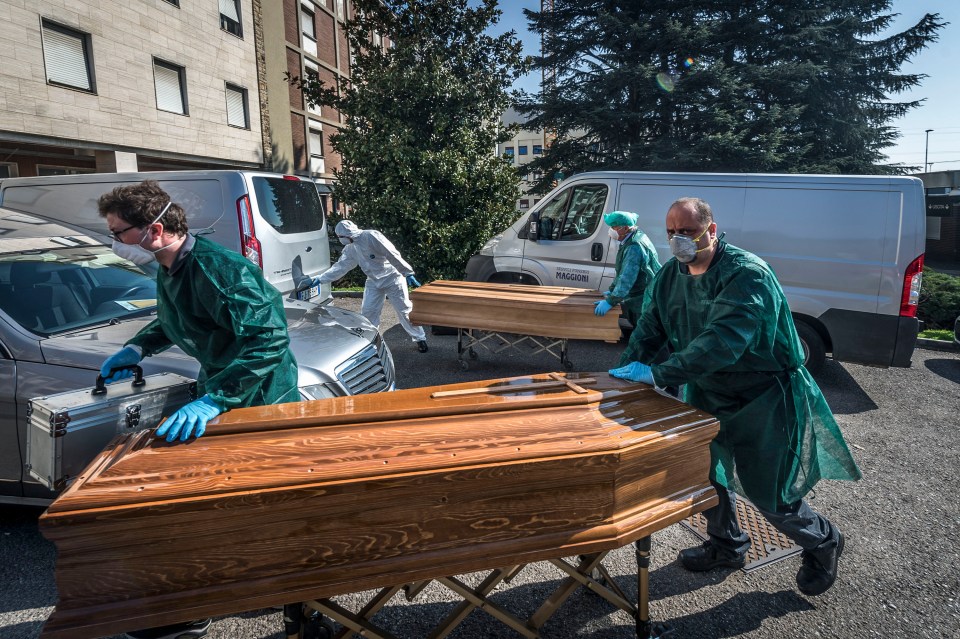  Coffins being wheeled into the morgue of Ponte San Pietro Hospital in the Province of Bergamo