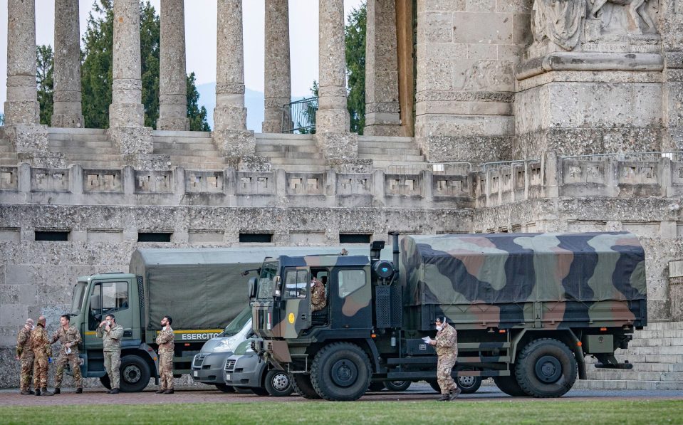  Italian troops outside the central cemetery in virus-stricken Bergamo