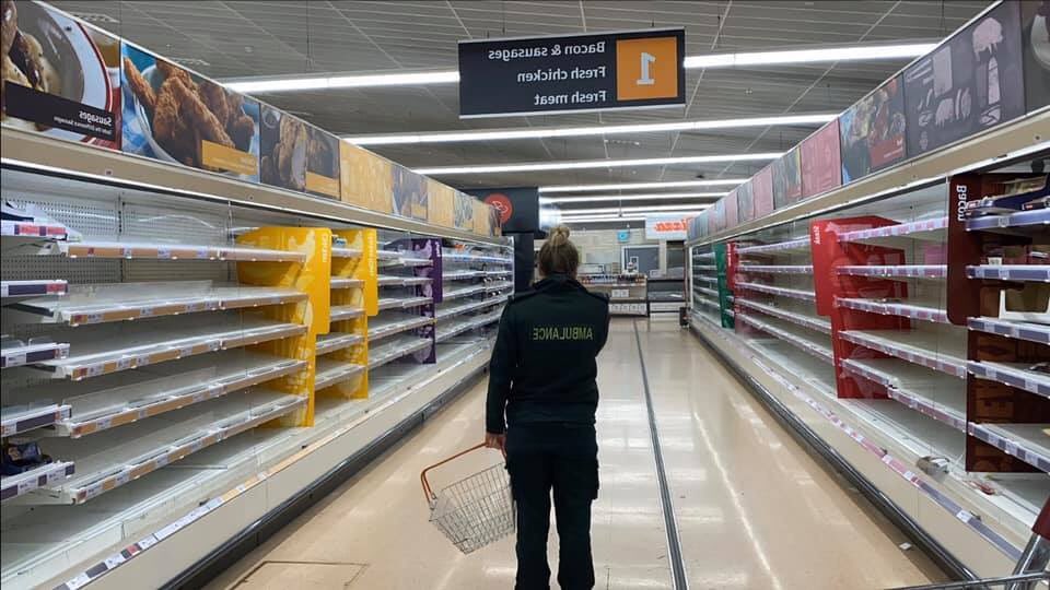 This picture has been circulating online of a paramedic looking at empty shelves – it is not known exactly where or when it was taken