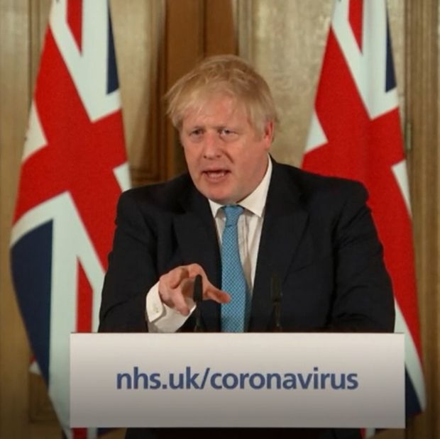 Prime Minister Boris Johnson speaking at a media briefing in Downing Street, London