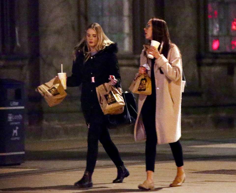 Two girls grab a takeaway after a night out boozing