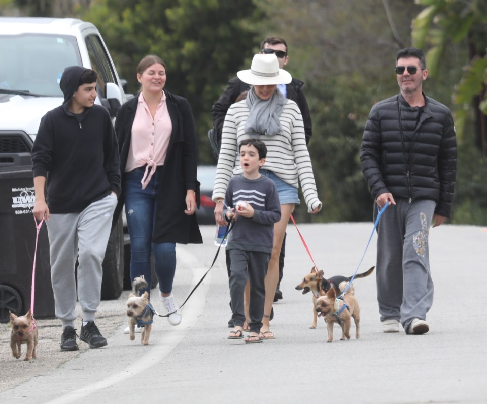  The family took Simon's beloved dogs out for a walk