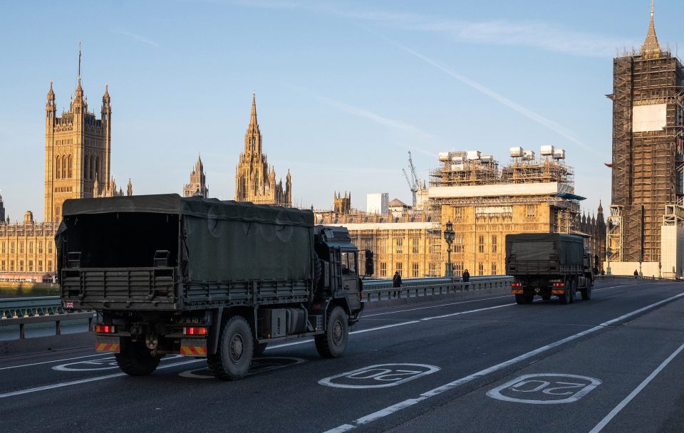  Military vehicles cross Westminster Bridge after members of the 101 Logistic Brigade delivered medical masks to St Thomas' Hospital