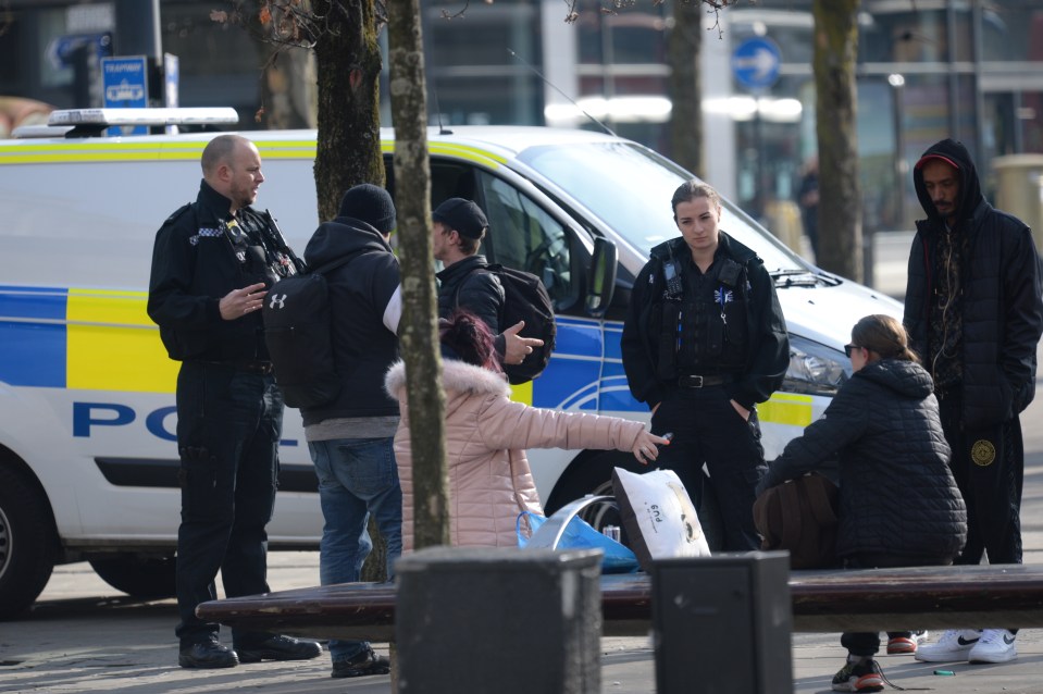 Police were seen dispersing a group in Piccadilly Gardens in Manchester city centre