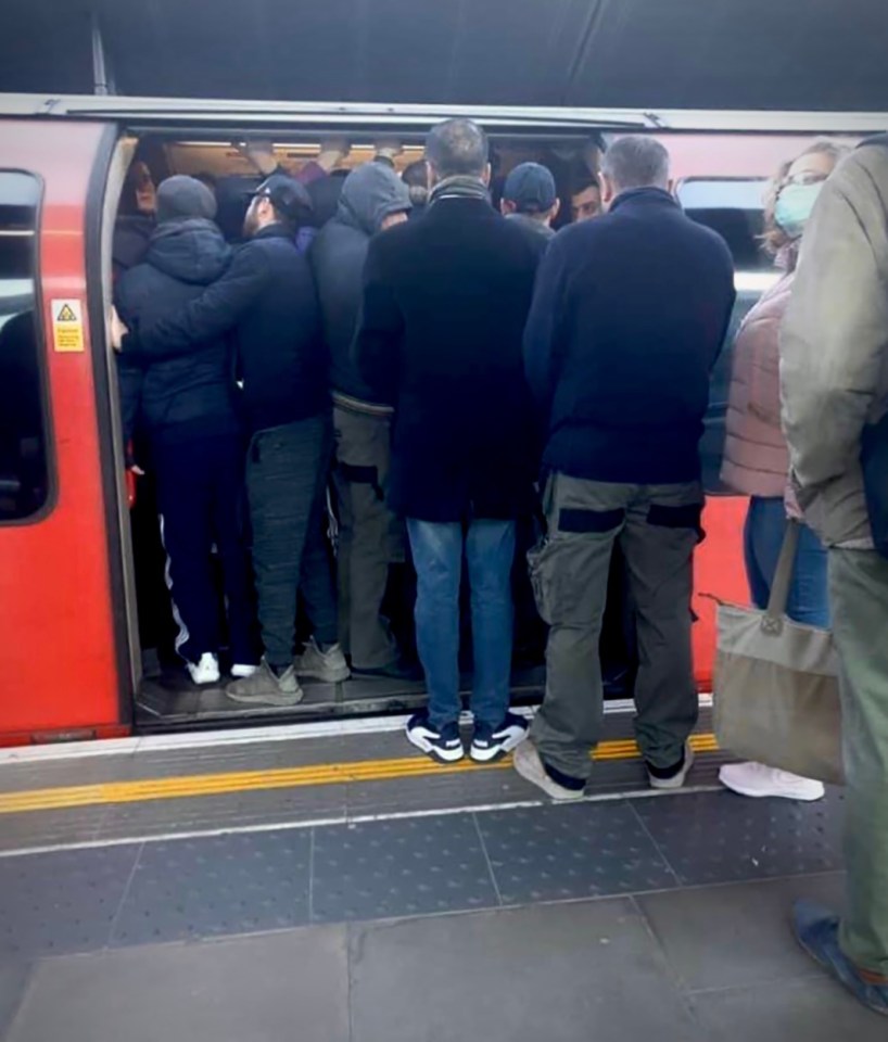  People are continuing to crowd onto packed trains in London