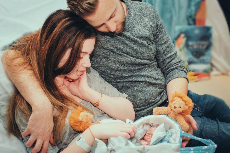  The couple are pictured with baby Samuel, who weighed just 400 grams