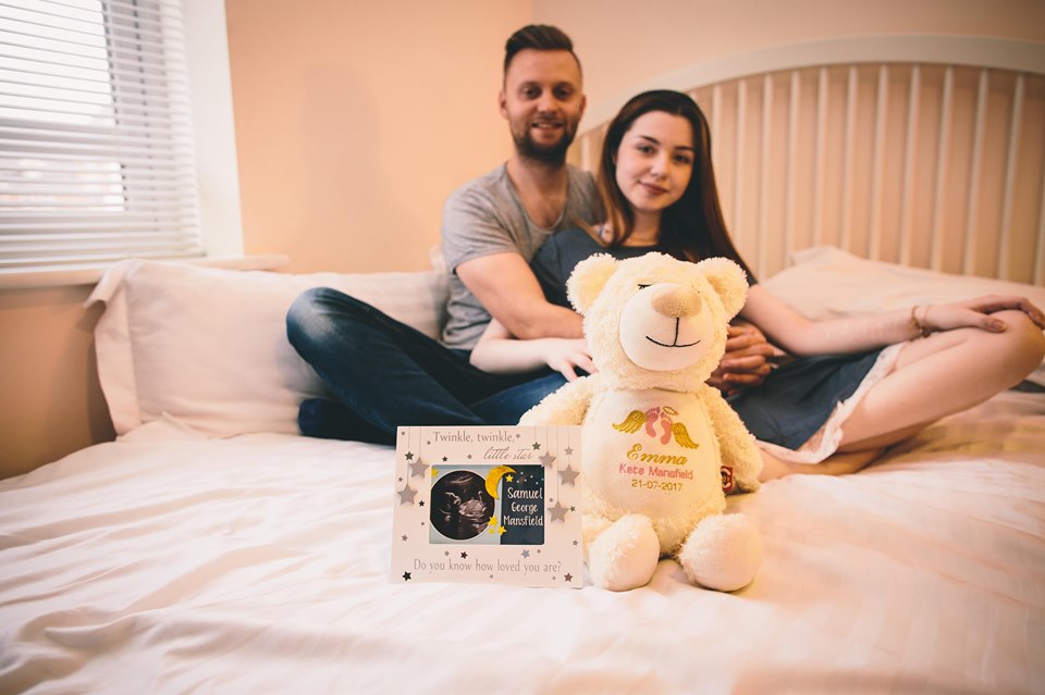  Chloe and Jordan, from Warwickshire, pose with a bear dedicated to Emma and Samuel's womb scan