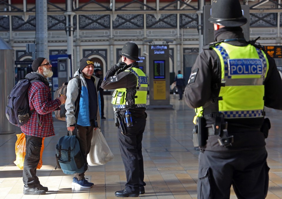  Police question commuters at Paddington station to ensure they are only making 'essential' journeys