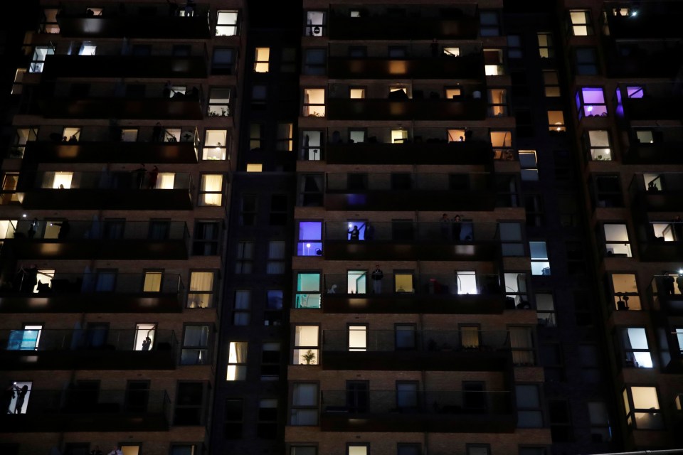 Locals in a London tower block show their support