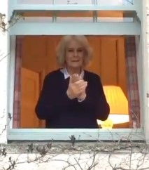 The Duchess of Cornwall was photographed clapping from her window