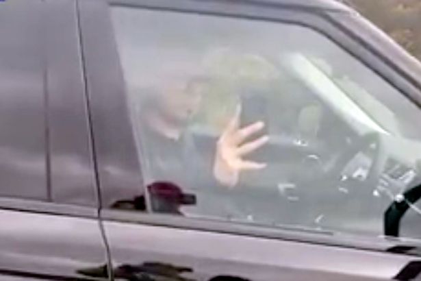 Furious local Aled Wyn Williams, from the nearby village of Bala, can be seen approaching the car in the video and confronting the man, who pulls out his phone to take a picture.