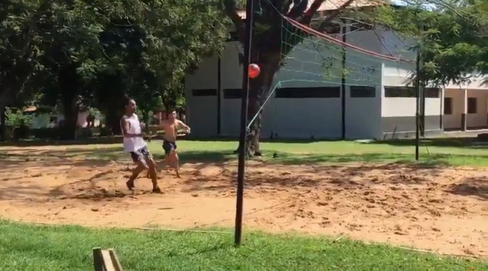 Ronaldinho soaked up the sunshine as he got stuck in with a game of footvolley while in a Paraguayan prison