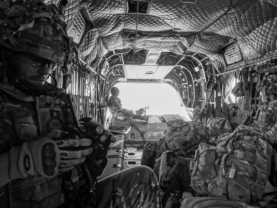  A group of soldiers inside a Herrick 17 helicopter on their way to their patrol base