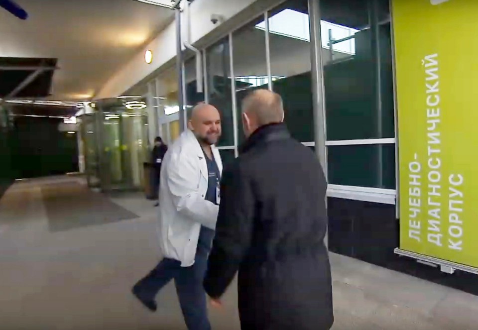  Dr Protsenko shaking hands with Putin as he greets him at the hospital