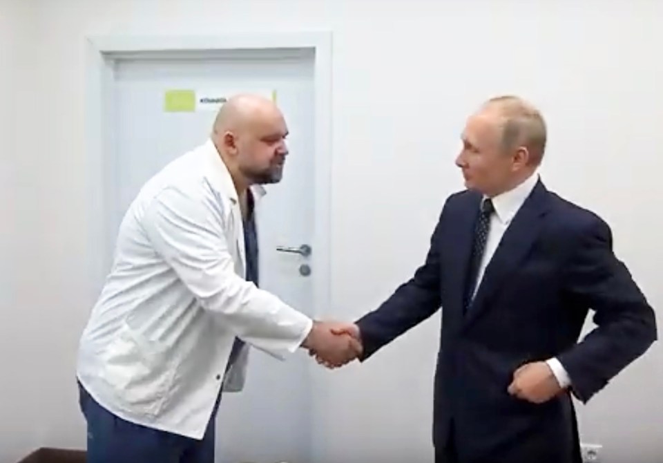  Dr Denis Protsenko shaking hands with Vladimir Putin last week