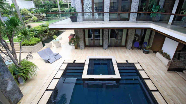 The property features a large swimming pool