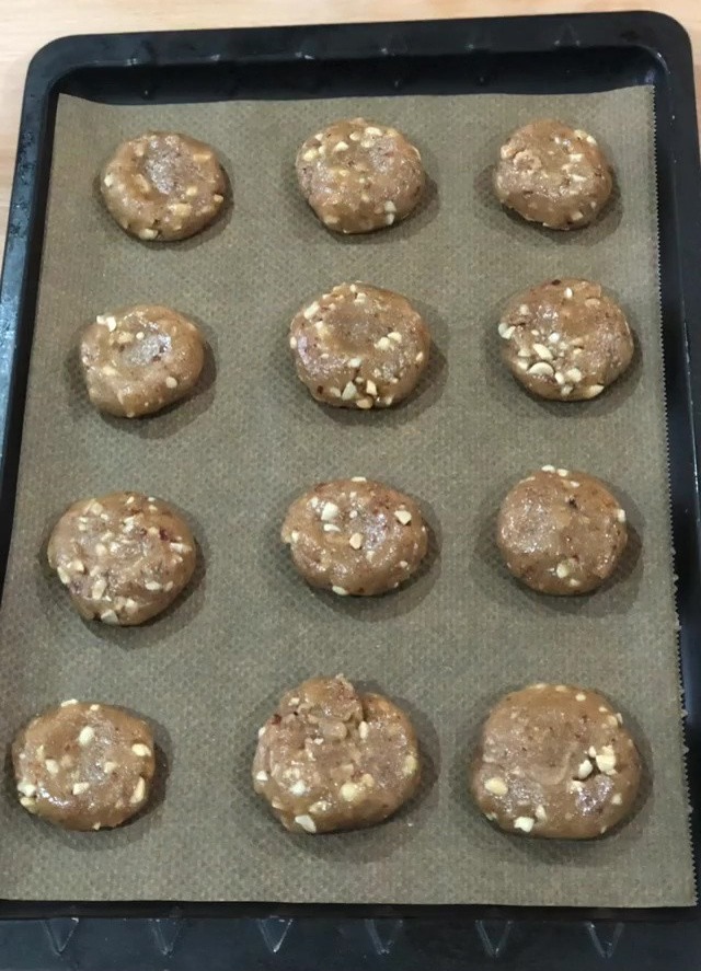 You need to get your hands messy and roll out 12 evenly spaced dough balls