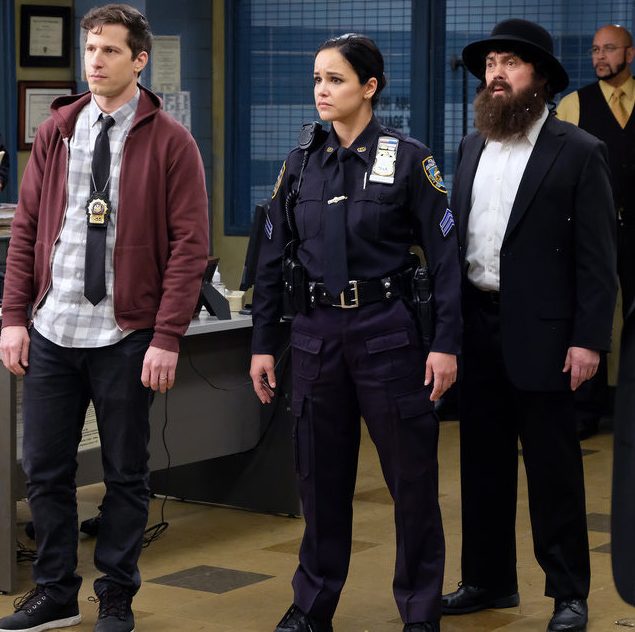  "Cinco De Mayo" Episode 616 - Pictured: (l-r) Andy Samberg as Jake Peralta, Melissa Fumero as Amy Santiago, Joe Lo Truglio as Charles Boyle